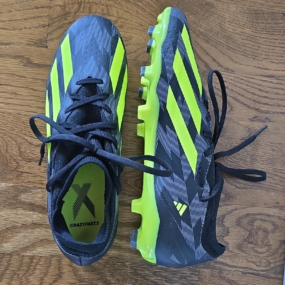 Adidas Black and Yellow Sneakers with Mesh Upper and Cushioned Sole